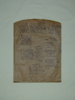 Back side of poetry-covered paper bag.
